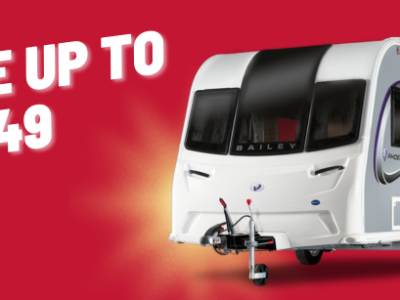 Graphic of caravan with text 'Save up to £2,349'